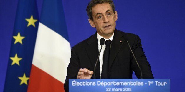 French UMP president Nicolas Sarkozy delivers a speech after the announcement of the first results of the first round of the French departmental local elections, on March 22, 2015 at the party's headquarters in Paris. AFP PHOTO / DOMINIQUE FAGET (Photo credit should read DOMINIQUE FAGET/AFP/Getty Images)