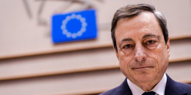 European Central Bank Governor Mario Draghi arrives for an Economic Affairs Committee meeting at the European Parliament in Brussels on Monday, March 23, 2015. Draghi presented the ECB's perspective on economic and monetary developments. (AP Photo/Geert Vanden Wijngaert)