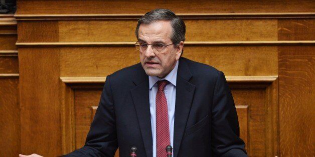 Greece main opposition party leader, Antonis Samaras speaks during a parliament session ahead of the confidence vote of the new government on February 10, 2015 in Athens. Greece's new leftist government fine-tuned a 10-point plan aimed at persuading its international creditors to reluctantly rethink their bailout terms and prevent the country from going bust. AFP PHOTO/ LOUISA GOULIAMAKI (Photo credit should read LOUISA GOULIAMAKI/AFP/Getty Images)