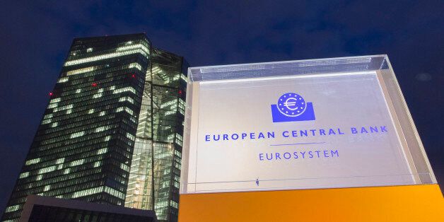 An illuminated sign for the European Central Bank (ECB) headquarters stands outside the main building in Frankfurt, Germany, on Friday, March 6, 2015. The final countdown is under way for the European Central Bank's program of government-bond purchases, which already fueled a debt-market rally that sent yields across the euro region to record lows. Photographer: Martin Leissl/Bloomberg via Getty Images
