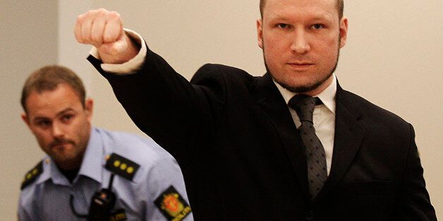 FILE - In this Aug. 24, 2012 file photo, mass murderer Anders Behring Breivik, makes a salute after arriving in the court room at a courthouse in Oslo. Breivik, who admitted killing 77 people in Norway last year, was declared sane and sentenced to prison for bomb and gun attacks. Convicted Norwegian mass-killer Breivik has threatened to go on hunger strike unless he gets access to better video games, a sofa and a larger gym. n a letter received by The Associated Press Tuesday Feb. 18, 2014, Br
