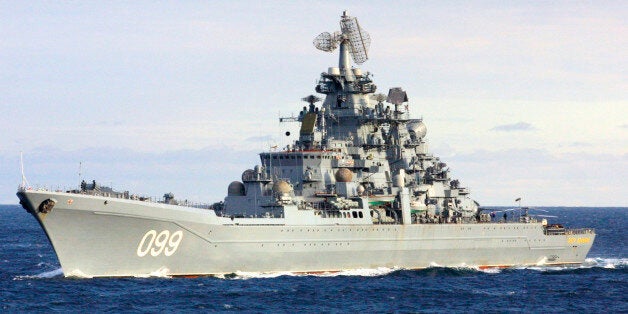 ** FILE ** The Pyotr Velikiy, Peter the Great, Russian nuclear-powered missile cruiser seen in the Barents Sea, Russia, , Russia, in this October, 2001 file photo. The Peter the Great cruiser accompanied by three other ships of Russia's Northern Fleet was to sail from their base in Severomorsk Sunday on a cruise which will include a joint exercise with the Venezuelan Navy, Russian Navy spokesman Igor Dygalo said on Vesti 24 television. (AP Photo/Dmitry Lovetsky, File)