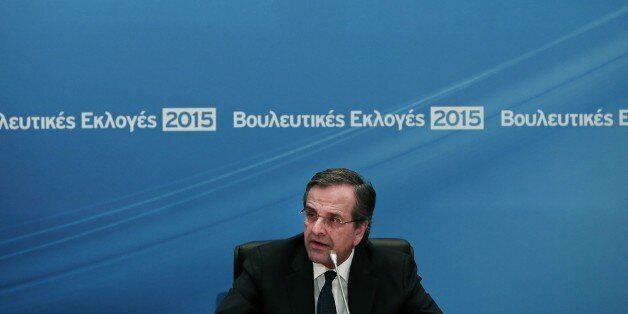 Greek prime minister Antonis Samaras delivers his statement to the press the Zappeion hall after general elections in Athens on January 25, 2015. The left-wing Syriza party led by Alexis Tsipras won Greece's general election on Sunday after campaigning on a pledge to renegotiate the country's international bailout and reverse years of spending cuts and painful economic reforms. AFP PHOTO / ANGELOS TZORTZINIS (Photo credit should read ANGELOS TZORTZINIS/AFP/Getty Images)