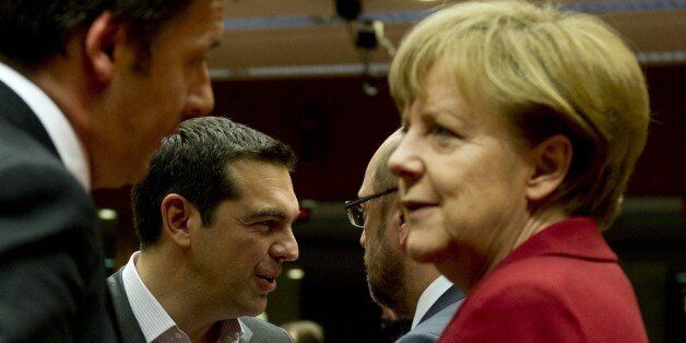 (From L) Italy's Prime minister Matteo Renzi, Greece's Prime minister Alexis Tsipras, European Parliament President Martin Schulz and Germany's Chancellor Angela Merkel talk before a working session during an European Council summit on March 19, 2015 at the Council of the European Union (EU) Justus Lipsius building in Brussels. European leaders meet for a two-day summit likely to be dominated by Greece's cash crunch and the question of whether to extend sanctions against Russia over the crisis in Ukraine. AFP PHOTO / ALAIN JOCARD (Photo credit should read ALAIN JOCARD/AFP/Getty Images)