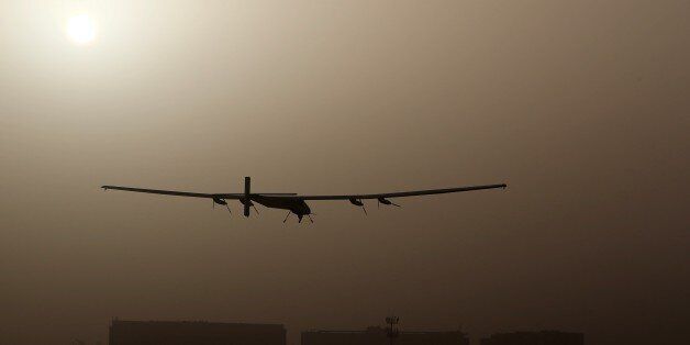 The Solar Impulse 2, takes off from al-Bateen airport in Abu Dhabi as it heads to Muscat, on March 9, 2015, in the first attempt to fly around the world in a plane using solar energy. The first attempt to fly around the world in a plane using only solar power launched on March 9 in Abu Dhabi in a landmark journey aimed at promoting green energy. AFP PHOTO / MARWAN NAAMANI (Photo credit should read MARWAN NAAMANI/AFP/Getty Images)