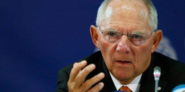 Germany's Minister of Finance Wolfgang Schauble answer questions during a news conference of the Informal Meeting of Ministers for Economic and Financial Affairs (ECOFIN) in the National Art Gallery in Vilnius, Lithuania, Saturday, Sept. 14, 2013. (AP Photo/Mindaugas Kulbis)
