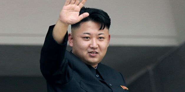 FILE - In this July 27, 2013, file photo, North Korean leader Kim Jong Un waves to spectators and participants of a mass military parade celebrating the 60th anniversary of the Korean War armistice in Pyongyang, North Korea. To say that Kim Jong Un is the leader of his country is a gross understatement. In North Korea, he is regarded as the epitome of his country. (AP Photo/Wong Maye-E, File)