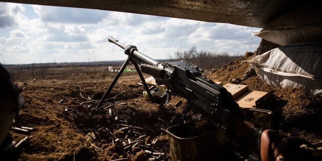 HORLIVKA, UKRAINE - MARCH 07: A machine gun sits inside a pro-Russian rebel trench along the front lines approximately two kilometers from Ukrainian troops roughly three weeks after the Minsk II cease fire agreement was signed on March 7, 2015 in Horlivka, Ukraine. While there have been sporadic accounts of attacks from both sides, the ceasefire has largely held. (Photo by Andrew Burton/Getty Images)