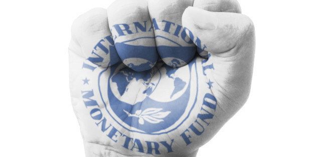Fist of IMF (International Monetary Fund) flag painted, multi purpose concept - isolated on white background