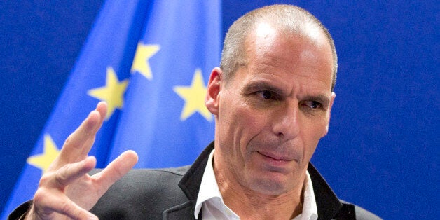 Greek Finance Minister Yanis Varoufakis speaks during a media conference after a meeting of eurogroup finance ministers in Brussels on Friday, Feb. 20, 2015. Eurozone finance ministers meet for a crucial day of talks Friday to see whether a Greek debt relief proposal is acceptable to Germany and other nations using the common currency. (AP Photo/Virginia Mayo)