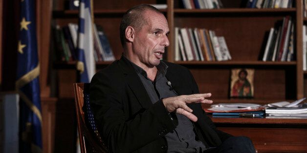 Yanis Varoufakis, Greece's finance minister, speaks during a Bloomberg Television interview at his office in Athens, Greece, on Wednesday, Feb. 25, 2015. Varoufakis said he's counting on the European Central Bank to help the country avert default when it runs out of money next month, while bank deposits are also starting to flow back. Photographer: Yorgos Karahalis/Bloomberg via Getty Images