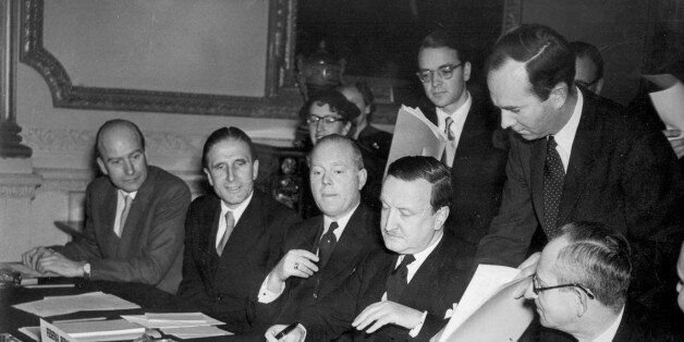 German Debts Agreement signed in London. The signing of the Agreement on German External Depts and of a number of related Agreements took place in London this morning, February 27, 1953, at Londonderry House. The AP-Photo shows: Herr Hermann J. Abs, the German Delegate, about to sign the agreement. Names of others are not mentioned. (AP-Photo)
