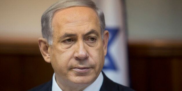 Israeli Prime Minister Benjamin Netanyahu attends the weekly cabinet meeting in his Jerusalem office, Sunday, Feb. 8, 2015. (AP Photo/Sebastian Scheiner, Pool)