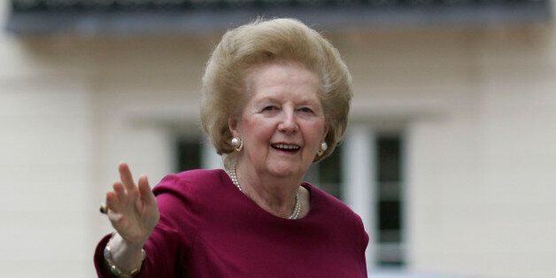 Former British Prime Minister, Margaret Thatcher waves as she arrives back at her home in London, returning from the hospital after been admitted last night, Saturday, March 8, 2008. (AP Photo/Sang Tan)