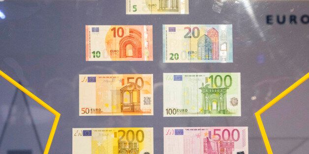 Various denominations of euro banknotes sits on display at the European Central Bank (ECB) headquarters in Frankfurt, Germany, on Tuesday, Feb. 24, 2015. Germany restored its position as Europe's economic powerhouse last quarter as domestic spending surged and trade contributed to growth. Photographer: Martin Leissl/Bloomberg via Getty Images