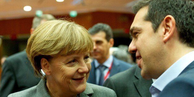 BRUSSELS, BELGIUM - FEBRUARY 12: Greek Prime Minister Alexis Tsipras (R) and German Chancellor Angela Merkel (L) attend a European Union summit at the EU Headquarters in Brussels, Belgium on February 12, 2015. (Photo by Council of Europe-Pool/Anadolu Agency/Getty Images)
