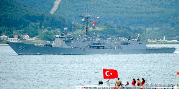 CANAKKALE, TURKEY - MAY 12: FFG-50 numbered US warship, the USS Taylor, passes through Turkey's Canakkale (Dardanelles) strait on May 12, 2014 in Canakkale, Turkey. (Photo by Mehmet Bayer/Anadolu Agency/Getty Images)