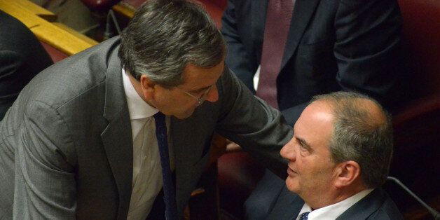 ATHENS, GREECE - 2015/02/18: Former Prime Minister Antonis Samaras (left) talks with MP with New Democracy Konstantinos Karamanlis(r).Legislators of the Greek parliament voted for the new President of the Greek Democracy. From the 295 present 233 voted for the Center Right Moderate candidate Prokopis Pavlopoulos that was nominated by SYRIZA political party. (Photo by George Panagakis/Pacific Press/LightRocket via Getty Images)