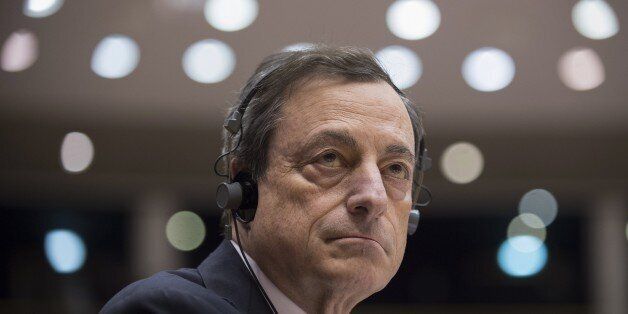 European Central Bank's (ECB) president Mario Draghi looks on during a debate on ECB's activities at the EU parliament in Brussels on February 25, 2015. AFP PHOTO/ JOHN THYS (Photo credit should read JOHN THYS/AFP/Getty Images)