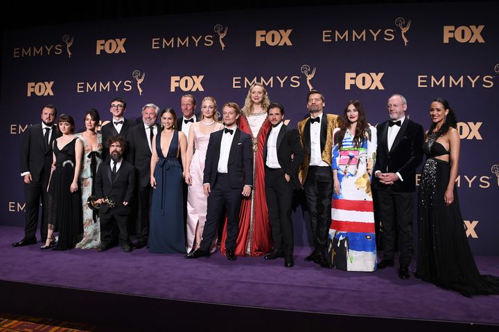 Cast and crew of 'Game of Thrones' pose with awards for Outstanding Drama Series in the press room during the 71st Emmy Awards at Microsoft Theater