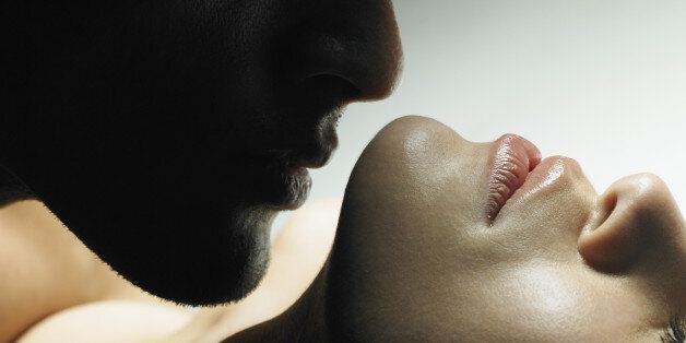 Man Kissing a Woman