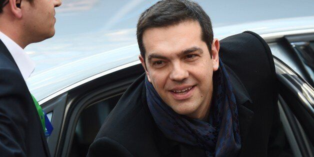 Greek Prime Minister Alexis Tsipras arrives ahead of the European Council Summit at the European Union (EU) Headquarters in Brussels on February 12, 2015. AFP PHOTO / EMMANUEL DUNAND (Photo credit should read EMMANUEL DUNAND/AFP/Getty Images)