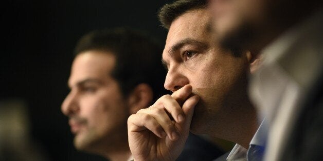 Greek Prime Minister Alexis Tsipras gives a press conference during the European Council Summit at the European Union (EU) Headquarters in Brussels on February 12, 2015. Greece's new Prime Minister Alexis Tsipras and German Chancellor Angela Merkel played down tensions today over demands by Athens to renegotiate its huge bailout as they met for the first time at a European summit. AFP PHOTO / JOHN THYS (Photo credit should read JOHN THYS/AFP/Getty Images)