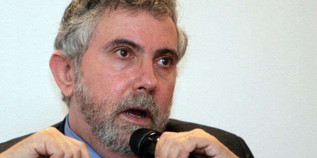 Nobel Prize-winning economist Paul Krugman speaks during a press conference at the World Capital Markets Symposium in Kuala Lumpur, Malaysia, Monday, Aug. 10, 2009. Aggressive stimulus spending by governments helped the world avoid a second Great Depression but full economic recovery will take two years or more, Krugman said Monday. (AP Photo/Lai Seng Sin)