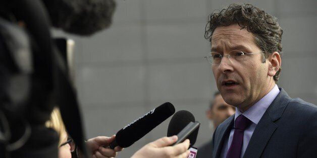 Eurogroup chairman Jeroen Dijsselbloem addresses reporters as he arrives for an emergency Eurogroup finance ministers meeting at the European Council in Brussels on February 11, 2015. Proposals by the new government in Athens to renegotiate the terms of its massive international bailout are scheduled to be discussed by eurozone finance ministers in Brussels on February 11 and 12. AFP PHOTO / JOHN THYS (Photo credit should read JOHN THYS/AFP/Getty Images)