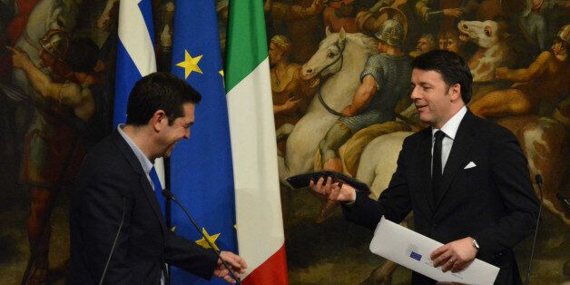 ROME, ITALY - FEBRUARY 03: Italian Prime Minister Matteo Renzi (R) and newly elected Greece's Prime Minister Alexis Tsipras (L) hold a press conference after their meeting at Palazzo Chigi on February 3, 2015 in Rome, Italy. (Photo by Baris Seckin/Anadolu Agency/Getty Images)