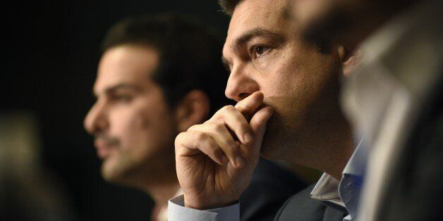 Greek Prime Minister Alexis Tsipras gives a press conference during the European Council Summit at the European Union (EU) Headquarters in Brussels on February 12, 2015. Greece's new Prime Minister Alexis Tsipras and German Chancellor Angela Merkel played down tensions today over demands by Athens to renegotiate its huge bailout as they met for the first time at a European summit. AFP PHOTO / JOHN THYS (Photo credit should read JOHN THYS/AFP/Getty Images)