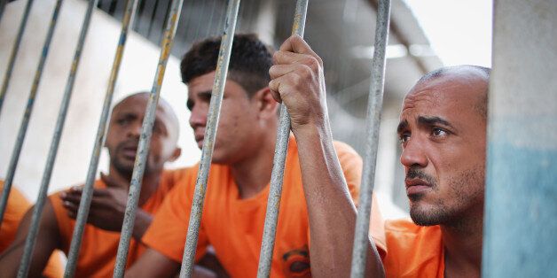 SAO LUIS, BRAZIL - JANUARY 27: Inmates gather in the Pedrinhas Prison Complex, the largest penitentiary in Maranhao state, on January 27, 2015 in Sao Luis, Brazil. Previously one of the most violent prisons in Brazil, Pedrinhas has seen efforts from a new state administration, new prison officials and judiciary leaders from Maranhao which appear to have quelled some of the unrest within the complex. In 2013, nearly 60 inmates were killed within the complex, including three who were beheaded dur