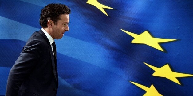 Eurogroup chairman Jeroen Dijsselbloem leaves after a press conference with the Greek Finance Minister in Athens on January 30, 2015. Greece's new anti-austerity government opened crucial negotiations with its eurozone partners on January 30 in what promises to be a bitter confrontation over its 240-billion-euro ($269 billion) international bailout. AFP PHOTO / ARIS MESSINIS (Photo credit should read ARIS MESSINIS/AFP/Getty Images)