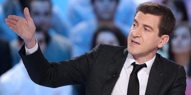 French banker Matthieu Pigasse, managing director of Lazard France bank and major shareholder of French daily paper 'Le Monde' group, gestures as he participates in the TV broadcast show 'Le Grand Journal' on Canal Plus channel, on March 13, 2012 in Paris. AFP PHOTO/JACQUES DEMARTHON (Photo credit should read JACQUES DEMARTHON/AFP/Getty Images)