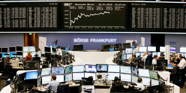 The curve of the German stock index DAX is displayed on a board at the stock market in Frankfurt, Germany, Monday, Jan. 26, 2015. Global financial markets shrugged off the election victory of an anti-austerity party in Greece, with most investors appearing to conclude on Monday that it is unlikely to lead the country to fall out of the euro. (AP Photo/Michael Probst)