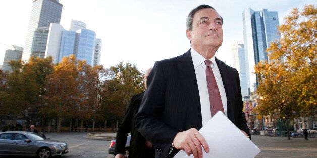 The President of the European Central Bank Mario Draghi is on his way to the European Banking Congress in Frankfurt, Germany, Friday, Nov.21, 2014. Draghi said the chief monetary authority for the eurozone is willing to