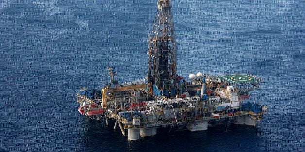 FILE - In this Monday Nov. 21, 2011 file photo, provided by the Cyprus Press and Information office, the Noble Energy company's offshore oil and gas rig is seen some 115 miles (185 kilometers) off Cyprus' south coast. Cyprus said Thursday, Oct. 3, 2013, its plan to turn itself into a regional energy hub remains on track, despite new findings showing that an offshore gas field is noticeably smaller than initially estimated. The small Mediterranean island nation, which earlier this year became the fifth country that uses the euro to receive outside financial assistance, is aiming to build a multibillion euro facility by 2019-20 to liquefy excess gas supply for export to Europe and beyond. (AP Photo/Cyprus Press and Information Office, File)