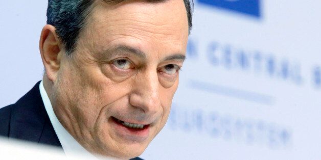 In this Thursday, Jan. 22, 2015 photo, President of European Central Bank Mario Draghi speaks during a news conference in Frankfurt, Germany, following a meeting of the ECB governing council. Draghi delivered on a pledge to do whatever it takes to pull Europe out of a deep and prolonged slump. The central bank will buy 1.1 trillion euros ($1.3 trillion) worth of government and corporate bonds through September 2016 _ longer if necessary _ to shrink the euroâs value, boost exports and encourage borrowing, spending and hiring. (AP Photo/Michael Probst)