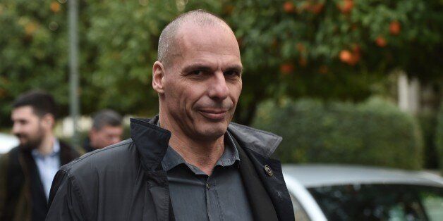 Greece's newly appointed finance minister Yanis Varoufakis walks along a street in Athens on January 27, 2015. Greece named radical left-wing economist Yanis Varoufakis its new finance minister on, giving him the mammoth task of leading negotiations with international creditors over the country's bailout.The appointment of Varoufakis is seen as a signal that the new anti-austerity Syriza-led government will take a hard line in haggling over the 240-billion-euro ($269 billion) EU-IMF package. AFP PHOTO / ARIS MESSINIS (Photo credit should read ARIS MESSINIS/AFP/Getty Images)