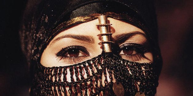 I didn't take this shot which was used in a local Vodafone campaign a few years back. This Arabian beauty from Sinai, Egypt is wearing a traditional bedouin head dress (that is covered with golden coins) to show her exotic eyes that are covered by an ancient dark makeup called "Kohl" originally used by the early Arabs and in ancient Egypt.