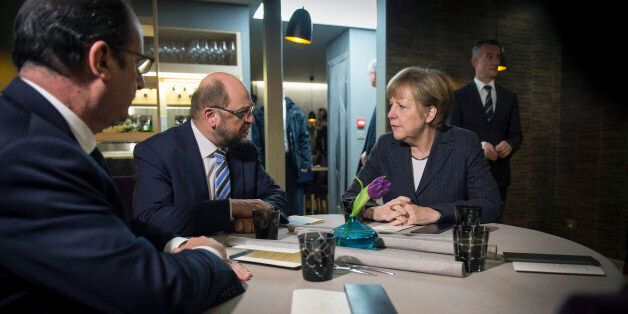 STRASBOURG, FRANCE - JANUARY 30: In this photo provided by the German Government Press Office (BPA), German Chancellor Angela Merkel (R), President of the European Parliament Martin Schulz (C) and French President Francois Hollande talk during their meeting on January 30, 2015 in Strasbourg, France. (Photo by Guido Bergmann/Bundesregierung via Getty Images)