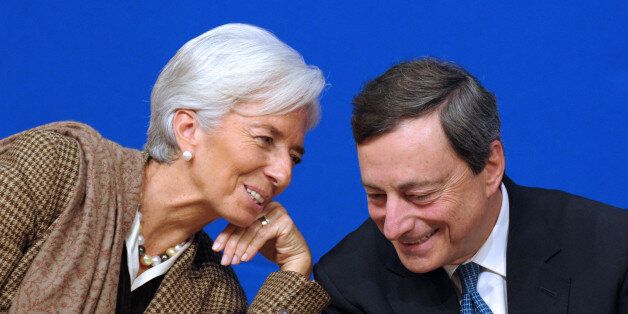 International Monetary Fund (IMF) Managing Director Christine Lagarde talks with European Central Bank (ECB) president Mario Draghi during the 'Treasury Talks' at French Economy and Finances Ministry on November 30, 2012 in Paris. AFP PHOTO ERIC PIERMONT (Photo credit should read ERIC PIERMONT/AFP/Getty Images)