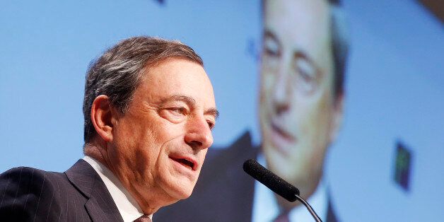 FILE - In this Nov. 21, 2014 file photo, European Central Bank President Mario Draghi delivers a speech at the European Banking Congress in Frankfurt, Germany. Europeâs economy was in recovery mode the first half of 2014 before being derailed by the Russia-Ukraine crisis. (AP Photo/Michael Probst, File)