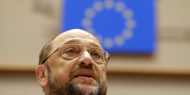 European Parliament President Martin Schulz addresses the members of the European Parliament to commemorate the 25th anniversary of the fall of the wall in Berlin, at the hemicycle of the European Parliament building in Brussels, Wednesday, Nov. 12, 2014. (AP Photo/Yves Logghe)