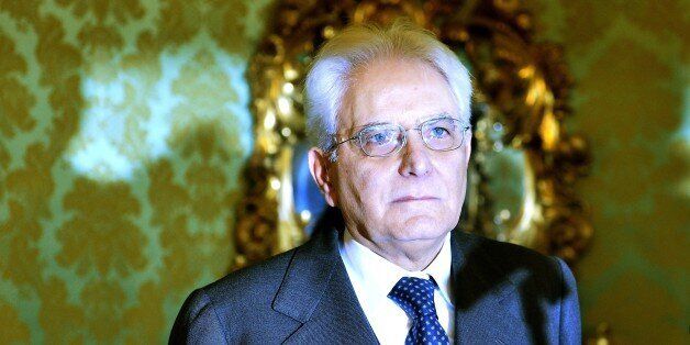 Newly elected President of Italy, Sicilian judge Sergio Mattarella looks on as he arrives at the Constitutional Council in Rome, on January 31, 2015. Renzi's backing for Mattarella has been interpreted as the end of a temporary alliance the premier forged with disgraced former prime minister Silvio Berlusconi to help drive labour market and electoral reforms through parliament. Mattarella is seen as an 'anti-Berlusconi' figure, having severed his ties with the centre right in Italian politics pa