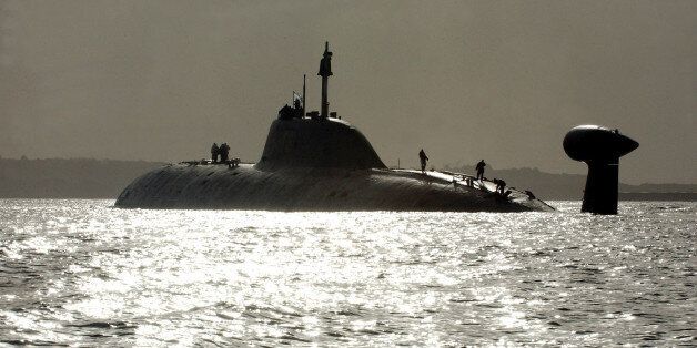 ** FILE ** One of Russia's Shchuka (Pike) class (NATO reporting name: Akula) nuclear submarines, The Vepr (Wild boar), the same type as The Nerpa (Seal), where at least 20 people were killed in an accident, seen heading towards Brest harbor, western France, after a series of exercises in the Atlantic with French navy ships, in this Tuesday Sept. 21, 2004, file photo. An accident aboard The Nerpa making a test run in the Sea of Japan killed at least 20 people, when a fire-extinguishing system wen