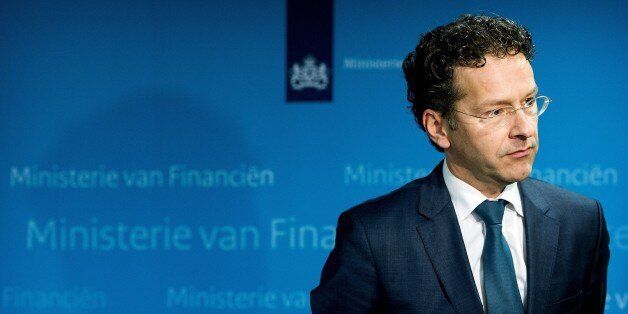 Eurogroup President and Dutch Finance Minister Jeroen Dijsselbloem reacts on the results of the comprehensive stress tests of European banks published by the ECB and the European European Banking Authority (EBA) at the Dutch Ministry of Finance in The Hague, The Netherlands, on October 26, 2014. According to Dijsselbloem the banks have anticipated, the past period, to already pick up additional capital. AFP PHOTO/ANP KOEN VAN WEEL netherlands out (Photo credit should read Koen van Weel/AF