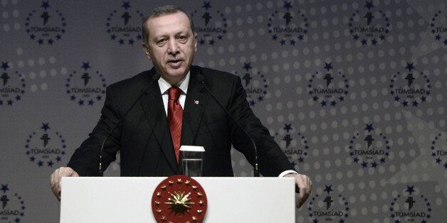 ISTANBUL, TURKEY - JANUARY 31: Turkish president Recep Tayyip Erdogan speaks during plenary session of TUMSIAD (All industrialists and Businessmen Association) in Istanbul, Turkey on January 31, 2015. (Photo by Berk Ozkan/Anadolu Agency/Getty Images)