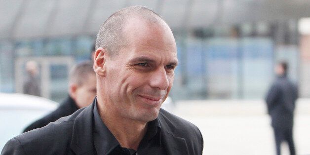 Greek Finance Minister Yanis Varoufakis arrives at the European Central Bank in Frankfurt, Germany Wednesday, Feb. 4, 2015. (AP Photo/Michael Probst)