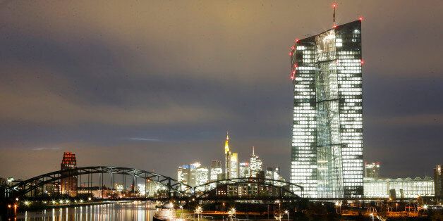 Lights burn in the new headquarters of the European Central Bank in Frankfurt, Germany, Monday, Nov.17, 2014. The ECB employees will move little by little into the new premises during the next weeks. (AP Photo/Michael Probst)